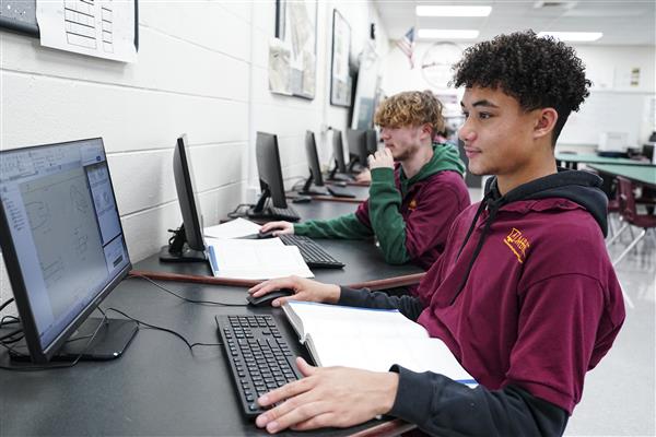Architecture and Construction Engineering students working on computers 